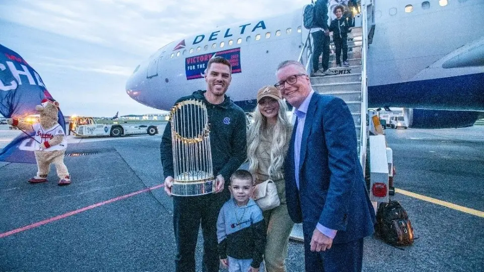 Ed poses with Freddie Freeman and his family.
