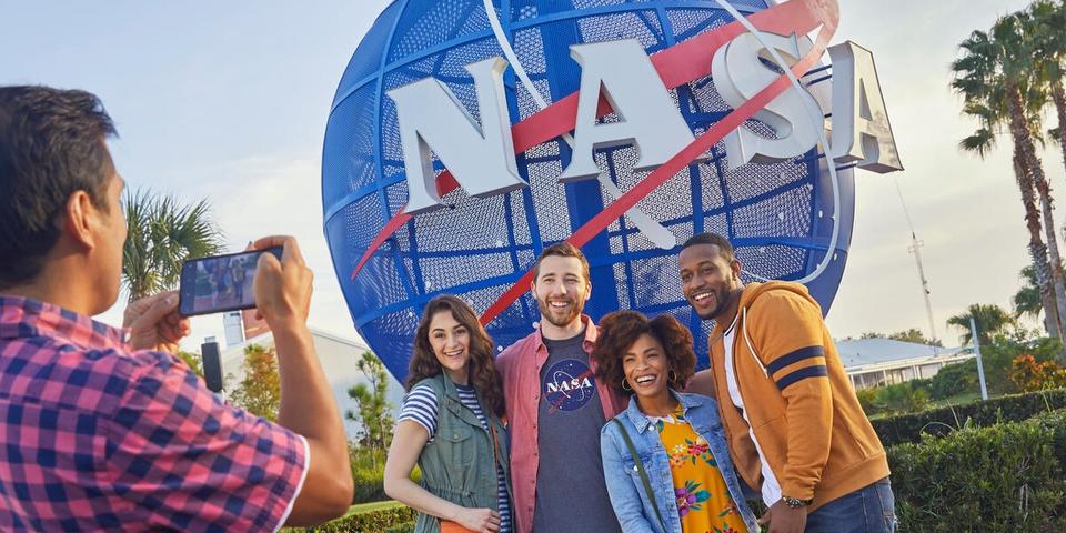 Tourists take a photo at the Kennedy Space Center in Orlando, Florida