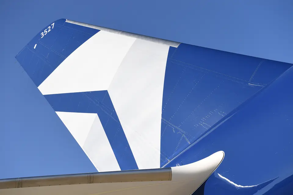 The tail of Delta's Centennial livery, which features the airline's Centennial colors: blue and silver.
