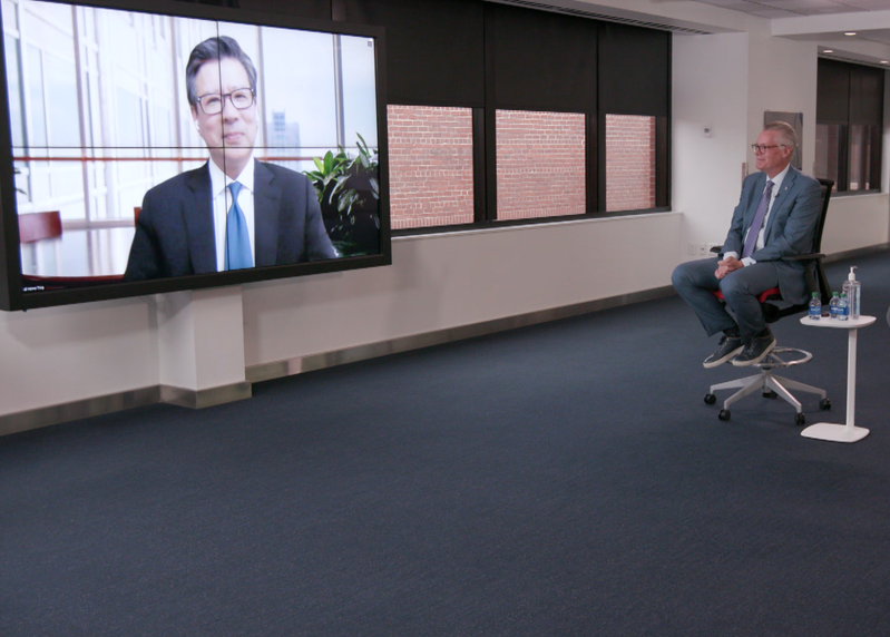 Delta CEO Ed Bastian conferencing with Chief Health Officer Dr. Henry Ting