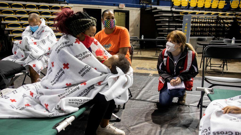 Families receive help at an American Red Cross shelter.