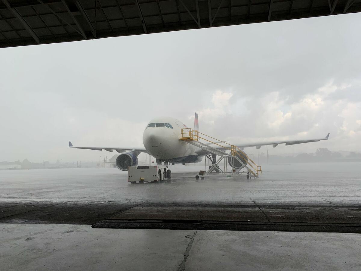 A storm rolls through Birmingham just before the last A330 Widebody departs storage 