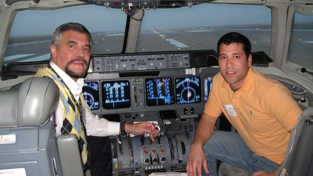 Mike Farinas and his father in the simulator together, pre-pandemic.