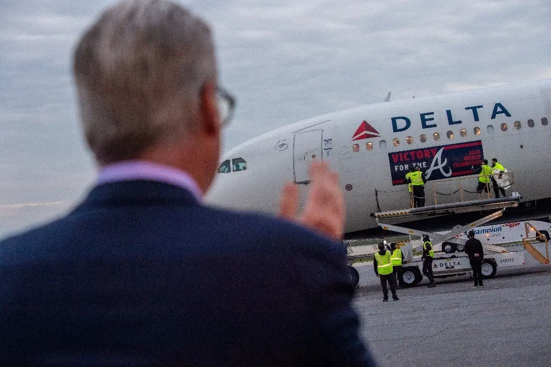 Ed Bastian looks on as the Braves' plane arrives.