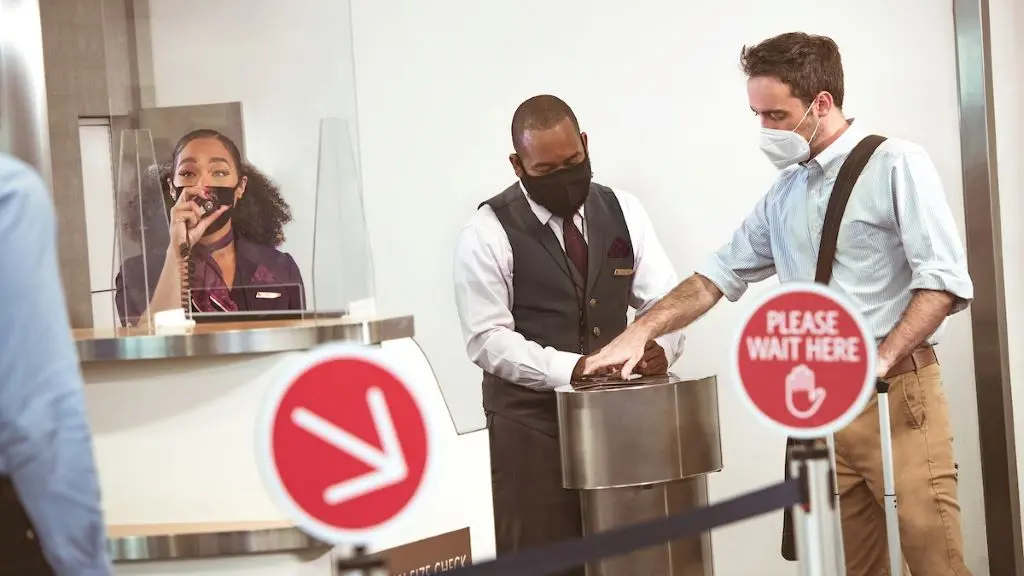 Customer scanning ticket on phone to board flight.