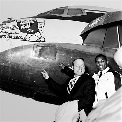 Georgia coach Vince Dooley with Herschel Walker