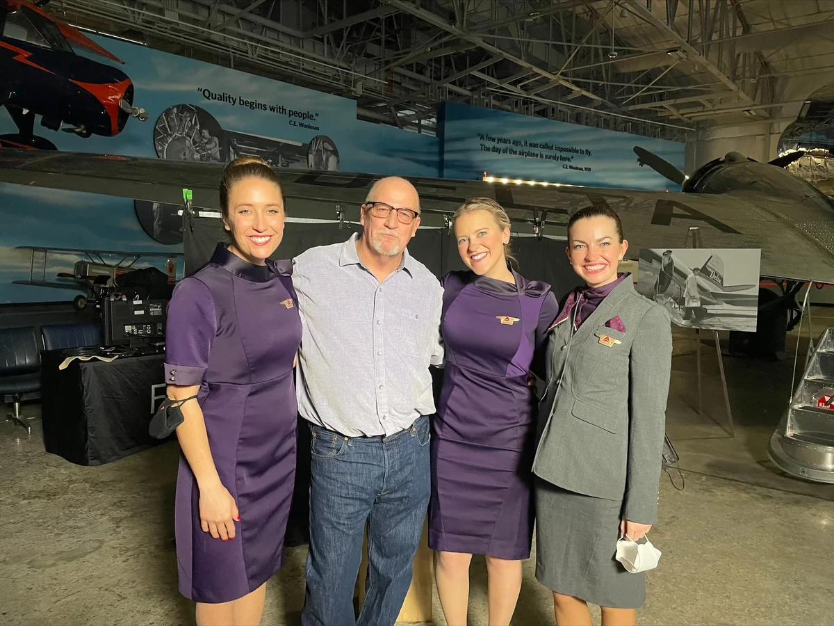 Scott McCulloch with the flight crew he credits with saving his life.