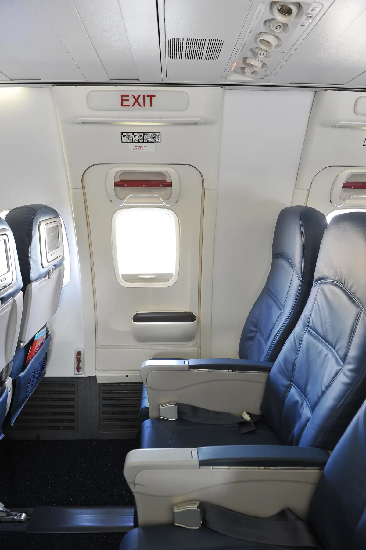A 737-800 interior seating and emergency window view