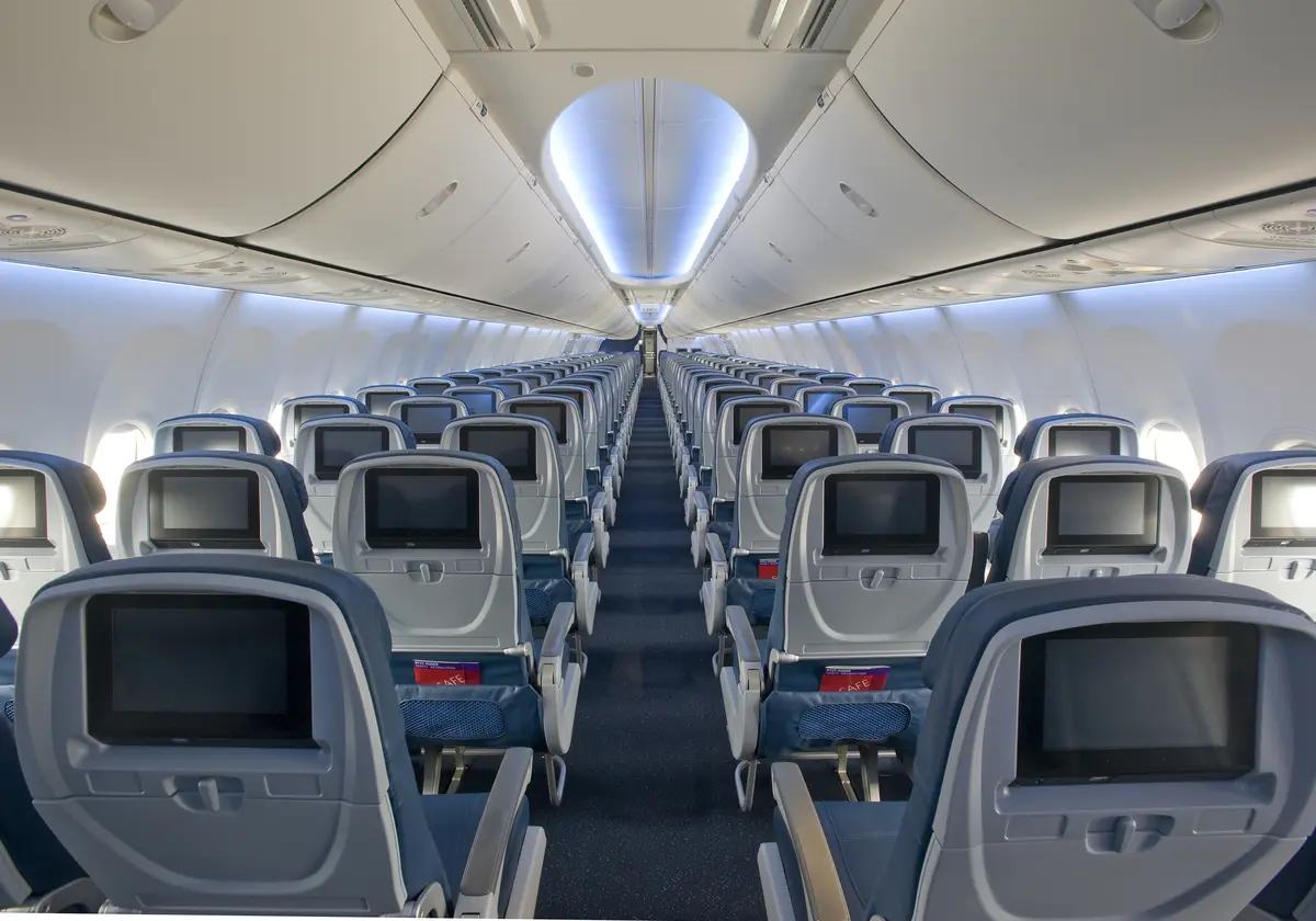 A view of the 737-900 shows the interior in the main cabin section of the aircraft.