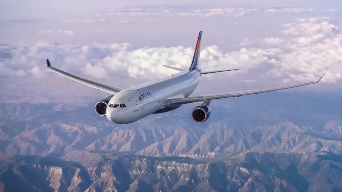 A330-300 in flight over mountains