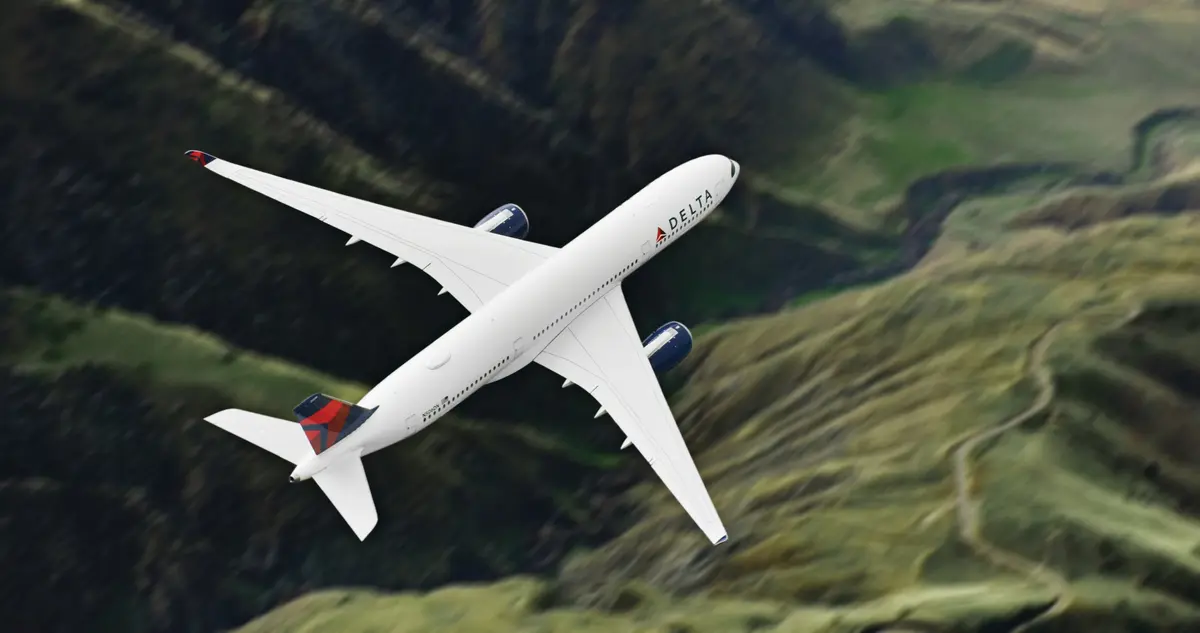 A350-900 in flight over mountains