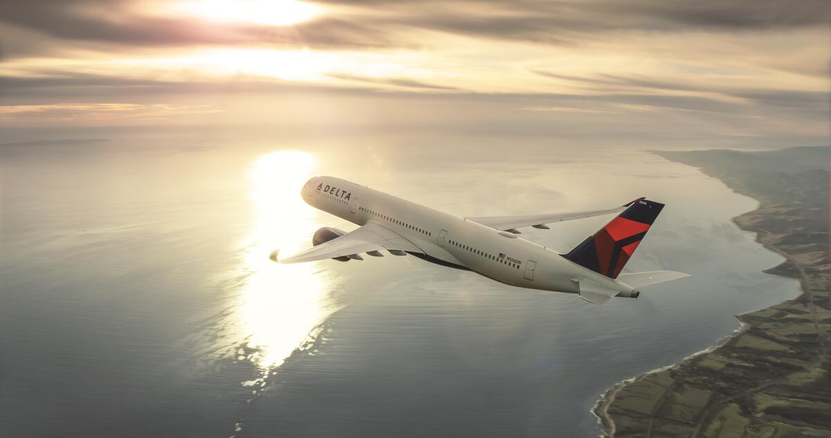 A350-900 in flight over water