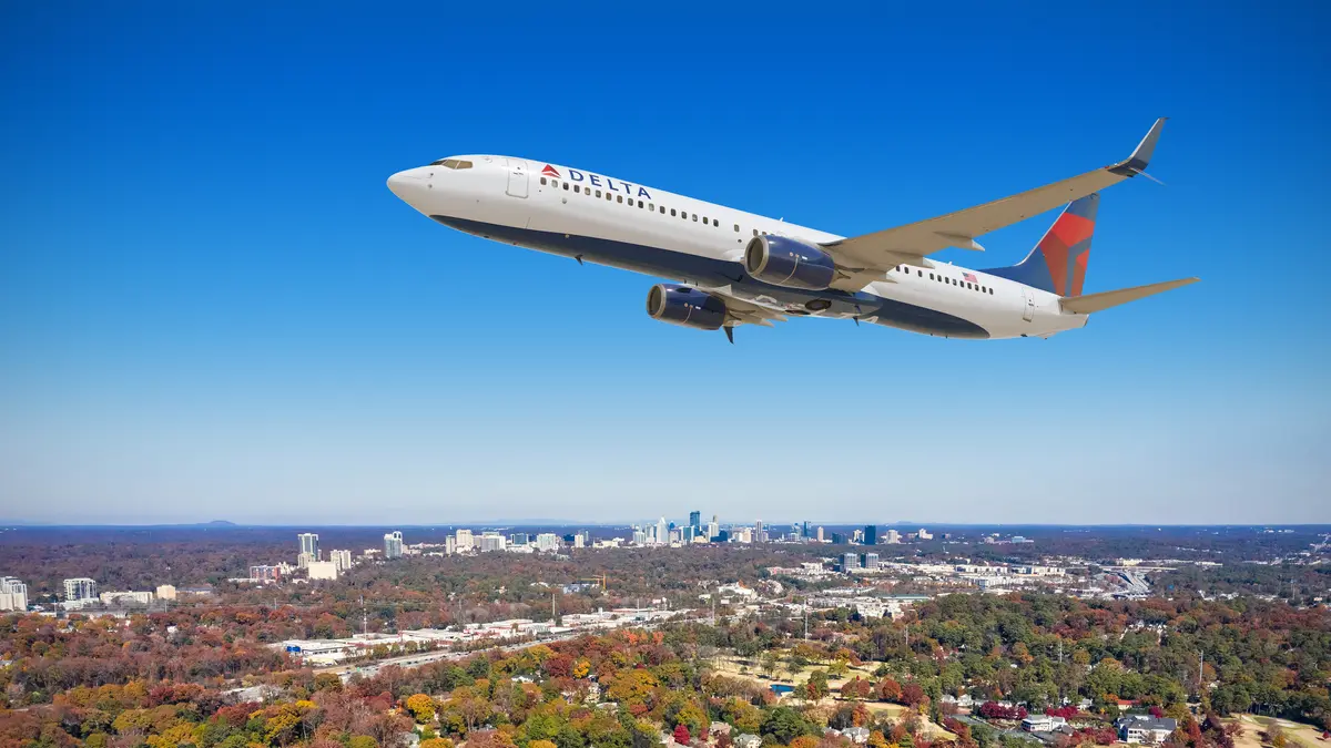 Boeing 737-10 in flight over Atlanta
