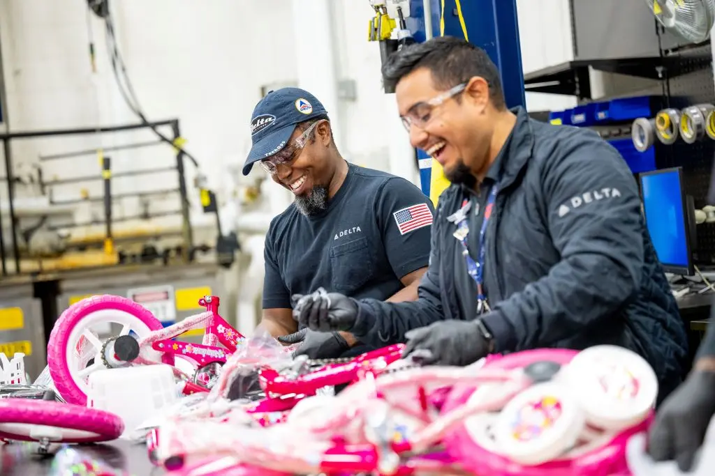 Delta people from TechOps, In-Flight Service, Global Sales, Finance, IT and Flight Operations rallied to purchase and assemble bicycles, as well as rally toy and money donations to support Toys for Tots.