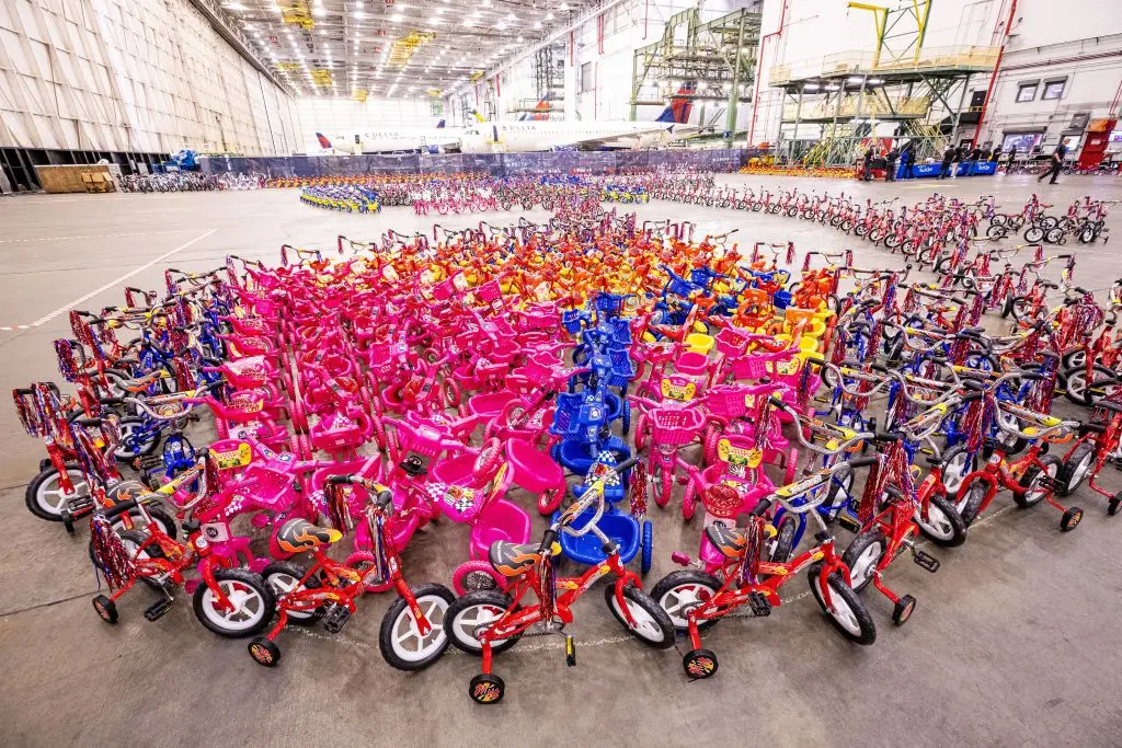 Delta people from TechOps, In-Flight Service, Global Sales, Finance, IT and Flight Operations rallied to purchase and assemble bicycles, as well as rally toy and money donations to support Toys for Tots.