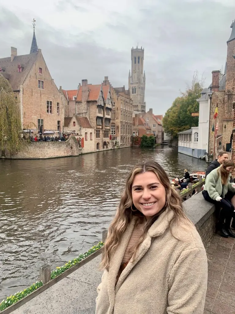 A Delta employee stands on the riverfront in Brussels.