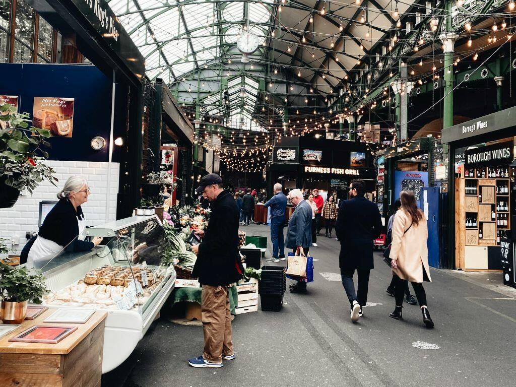 People walking through Borough Market in London