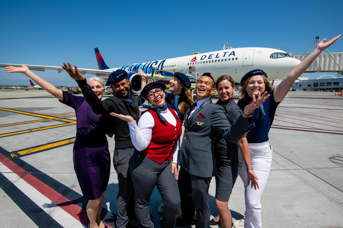 Delta people, customers and friends celebrate the departure of Delta Flight 290 from Los Angeles International Airport (LAX) to Paris Charles de Gaulle Airport (CDG).