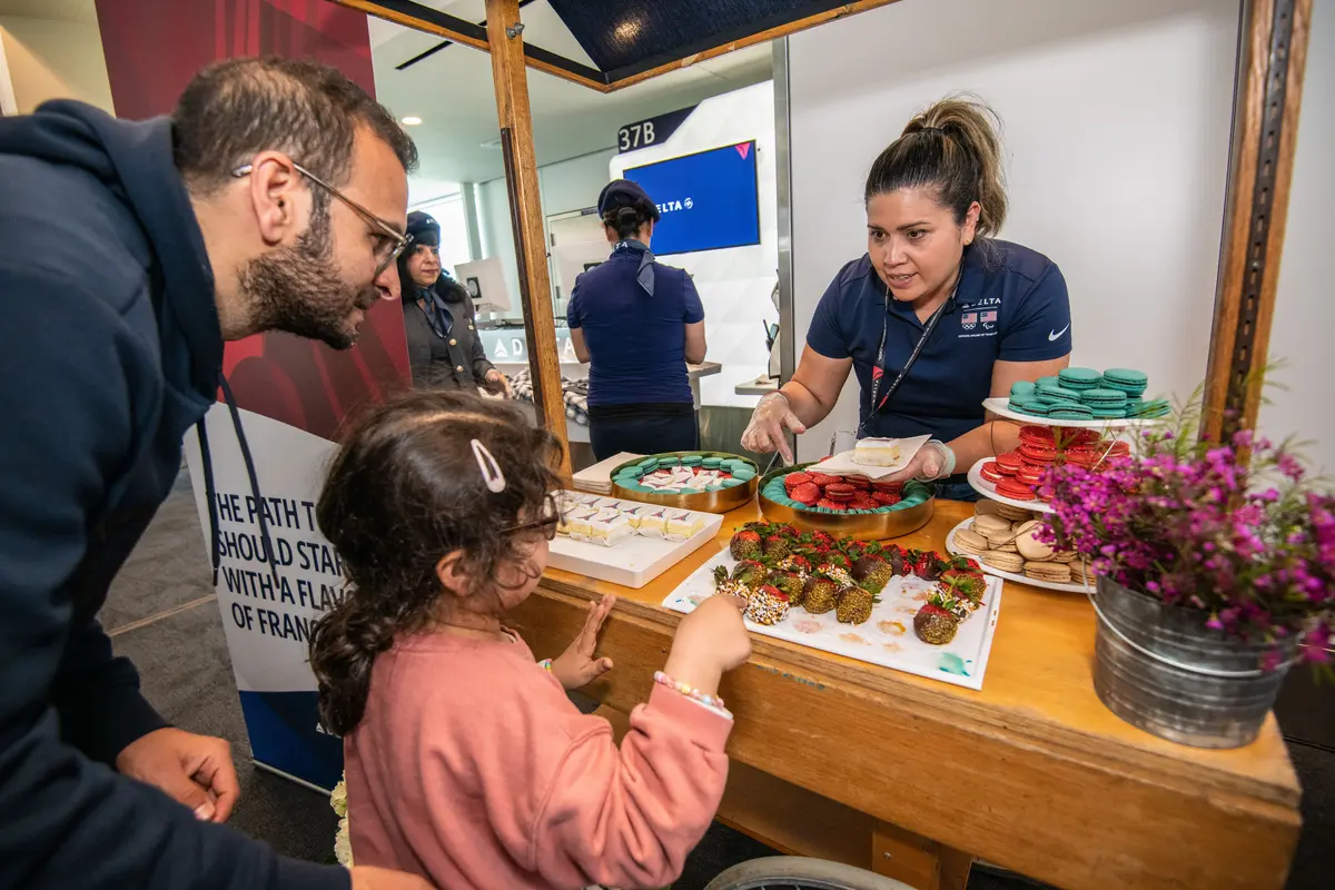 Delta people, customers and friends celebrate the departure of Delta Flight 290 from Los Angeles International Airport (LAX) to Paris Charles de Gaulle Airport (CDG).