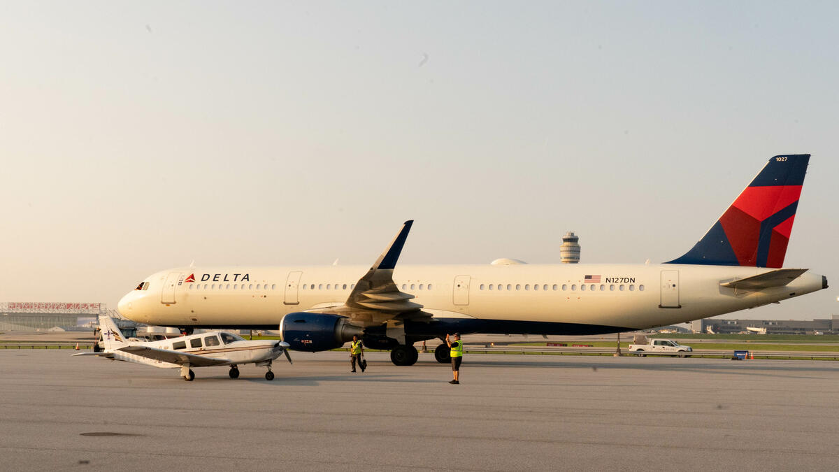 Pilots Barry Behnfeldt and Aaron Wilson, along with maintenance technician Thomas Twiddy make a stop at Hartsfield-Jackson Atlanta International Airport (ATL) during their 48N48 mission -- an attempt to land in all 48 of the contiguous states within 48 hours. They were greeted by Delta Chief of Operations John Laughter.