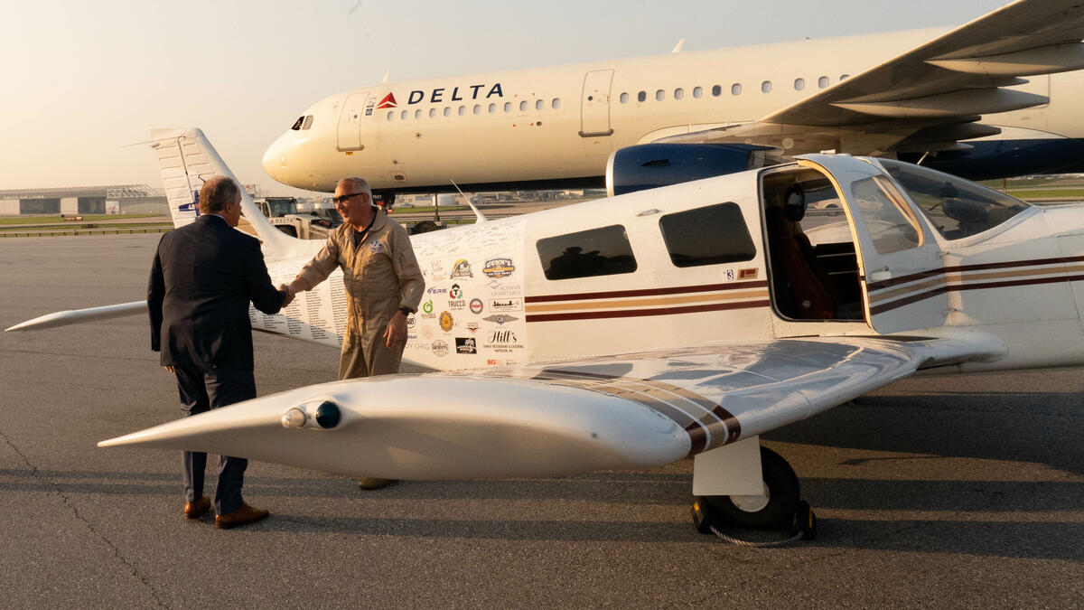 Pilots Barry Behnfeldt and Aaron Wilson, along with maintenance technician Thomas Twiddy make a stop at Hartsfield-Jackson Atlanta International Airport (ATL) during their 48N48 mission -- an attempt to land in all 48 of the contiguous states within 48 hours. They were greeted by Delta Chief of Operations John Laughter.