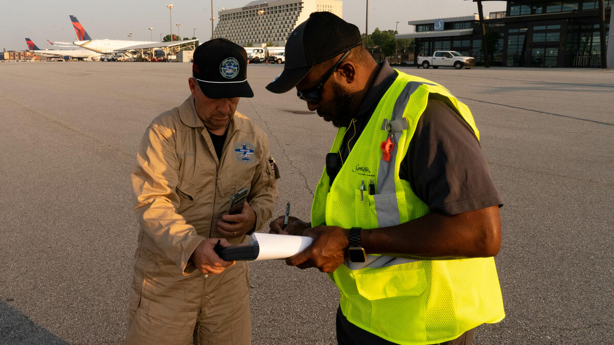 Pilots Barry Behnfeldt and Aaron Wilson, along with maintenance technician Thomas Twiddy make a stop at Hartsfield-Jackson Atlanta International Airport (ATL) during their 48N48 mission -- an attempt to land in all 48 of the contiguous states within 48 hours. They were greeted by Delta Chief of Operations John Laughter.