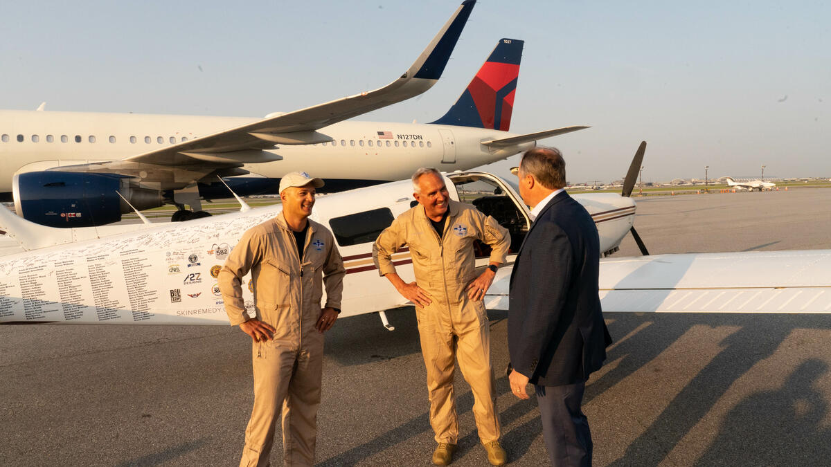 Pilots Barry Behnfeldt and Aaron Wilson, along with maintenance technician Thomas Twiddy make a stop at Hartsfield-Jackson Atlanta International Airport (ATL) during their 48N48 mission -- an attempt to land in all 48 of the contiguous states within 48 hours. They were greeted by Delta Chief of Operations John Laughter.