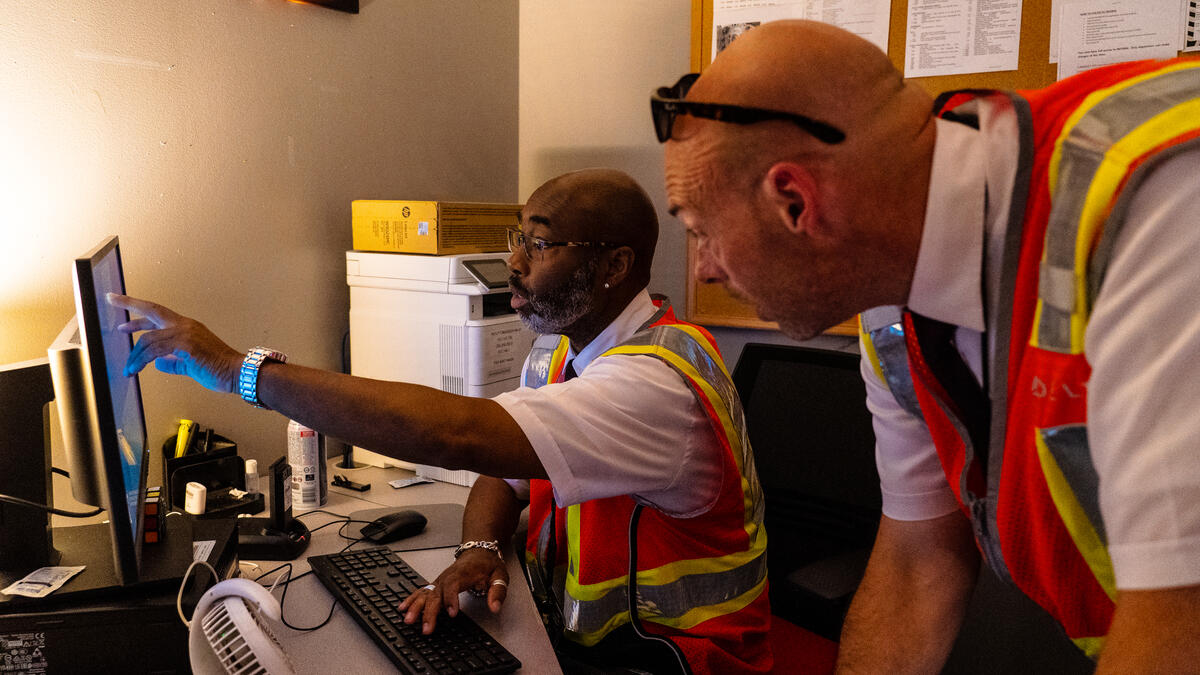 Delta Elite Services Ambassadors Anthony Grant (left) and Dan Lavker (right) plan to surprise and delight customers with Porsche transfers to connecting flights.