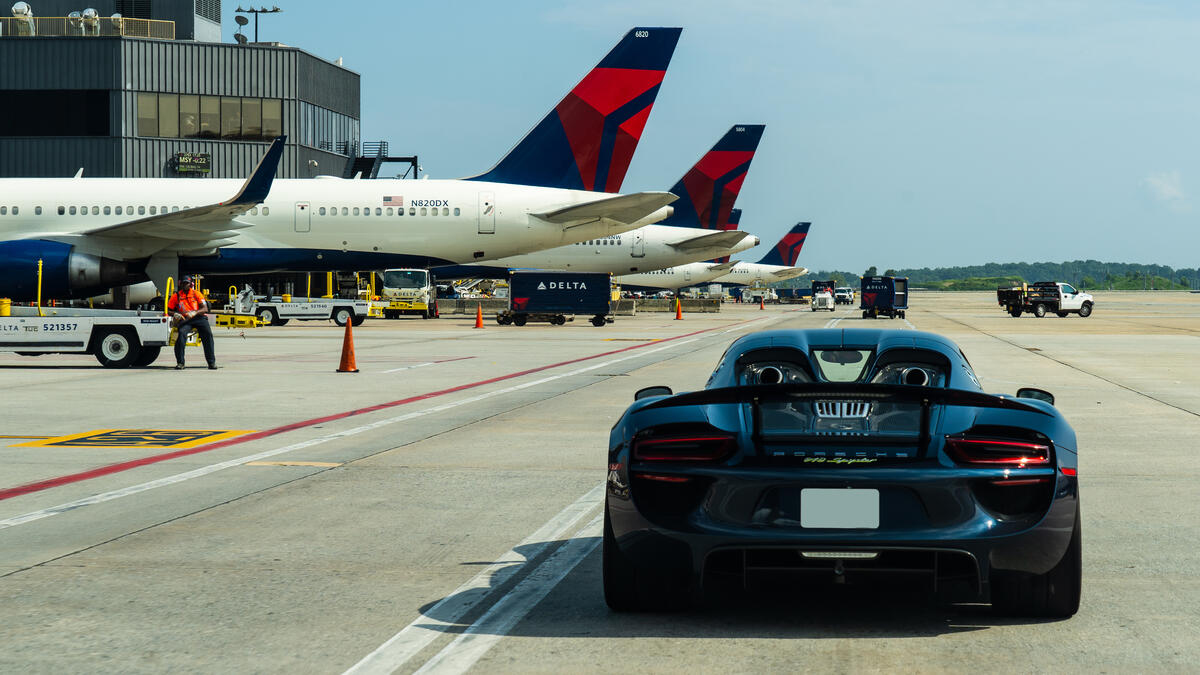 A Porsche 918 Spyder carries a Delta customer to a connecting flight at Hartsfield-Jackson Atlanta International Airport.