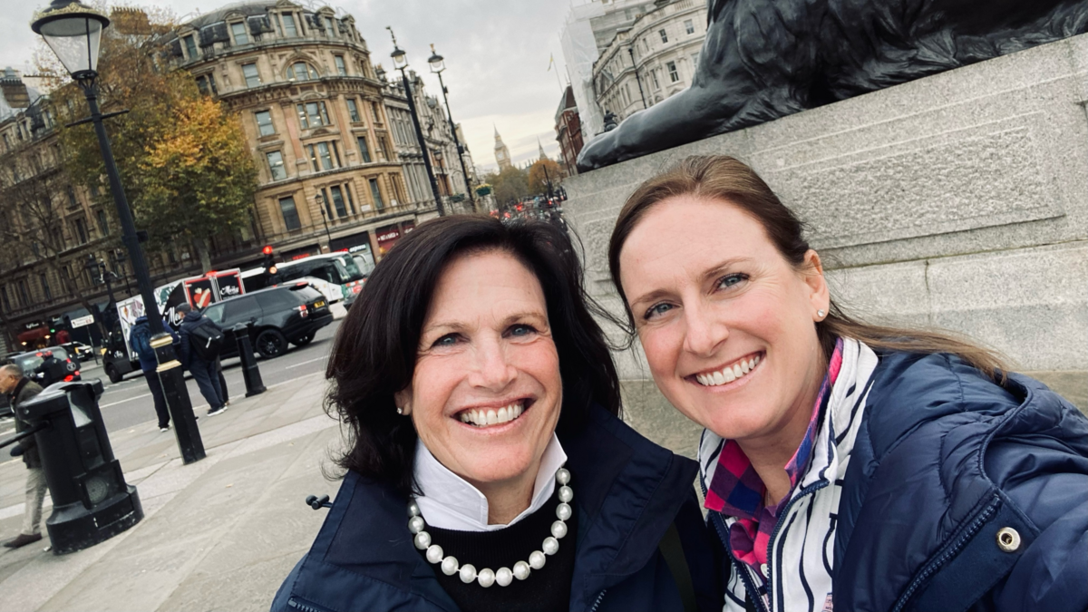 A mother and daughter duo who have nearly 30 years of combined service at Delta pose for a selfie in London.