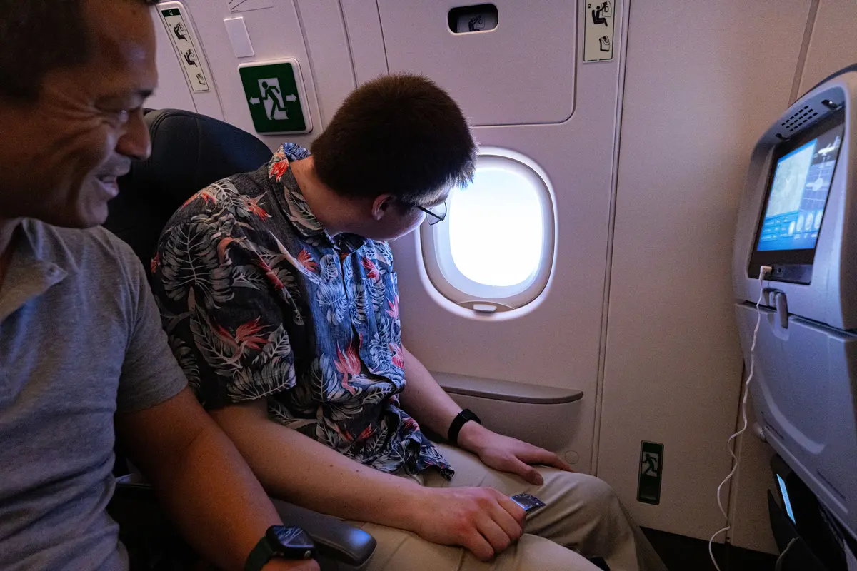 Customers on board DL 1010 from Dallas Fort Worth International Airport (DTW) to Detroit Wayne County Metropolitan Airport (DFW) view the solar eclipse.
