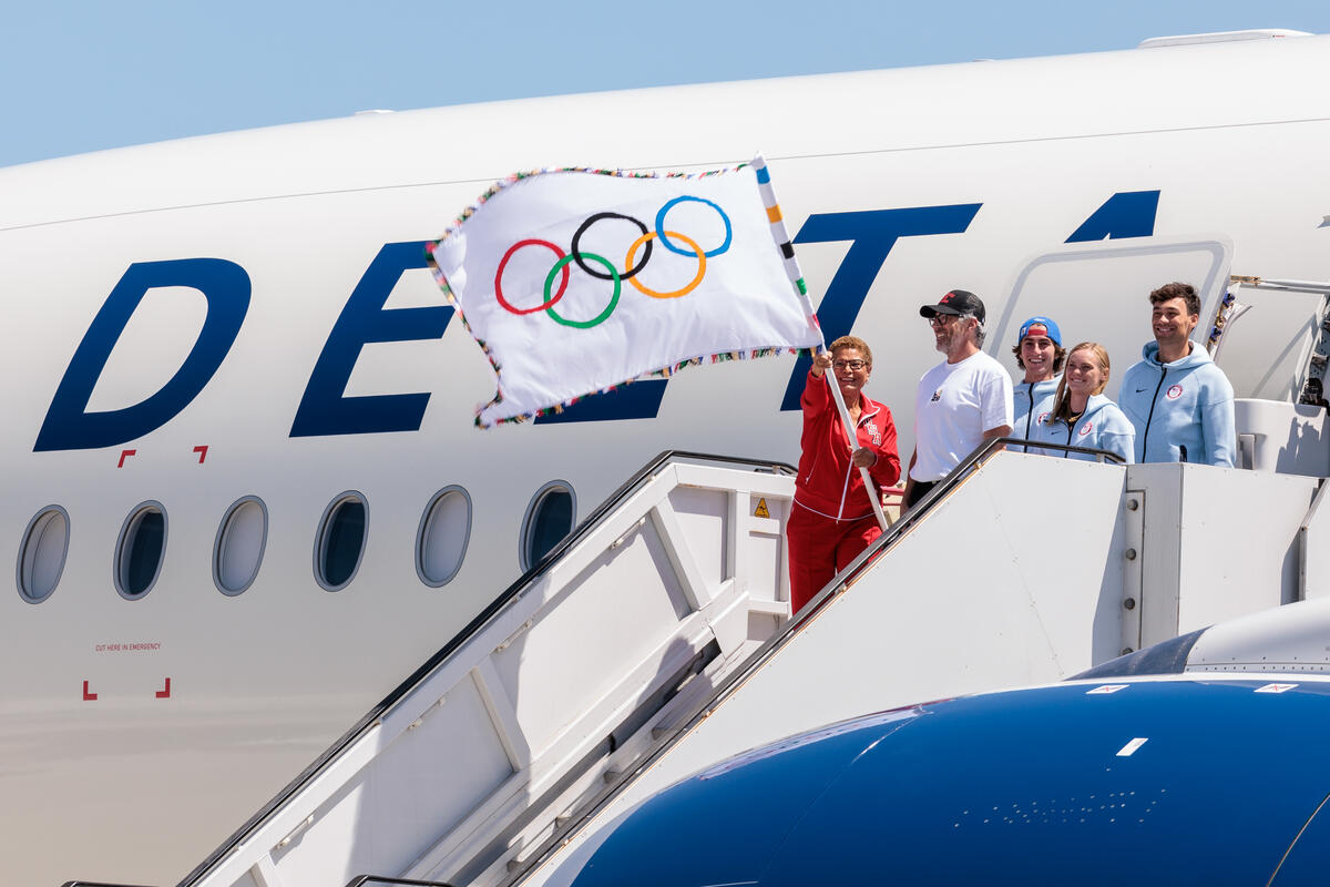 As the Official Airline of Team USA and an inaugural Founding Partner of the LA28 Olympic and Paralympic Games, Delta is honored to be part of the flag’s transfer from one iconic city to the next, bringing a delegation from Team USA, LA28, and notable dignitaries on board as well.