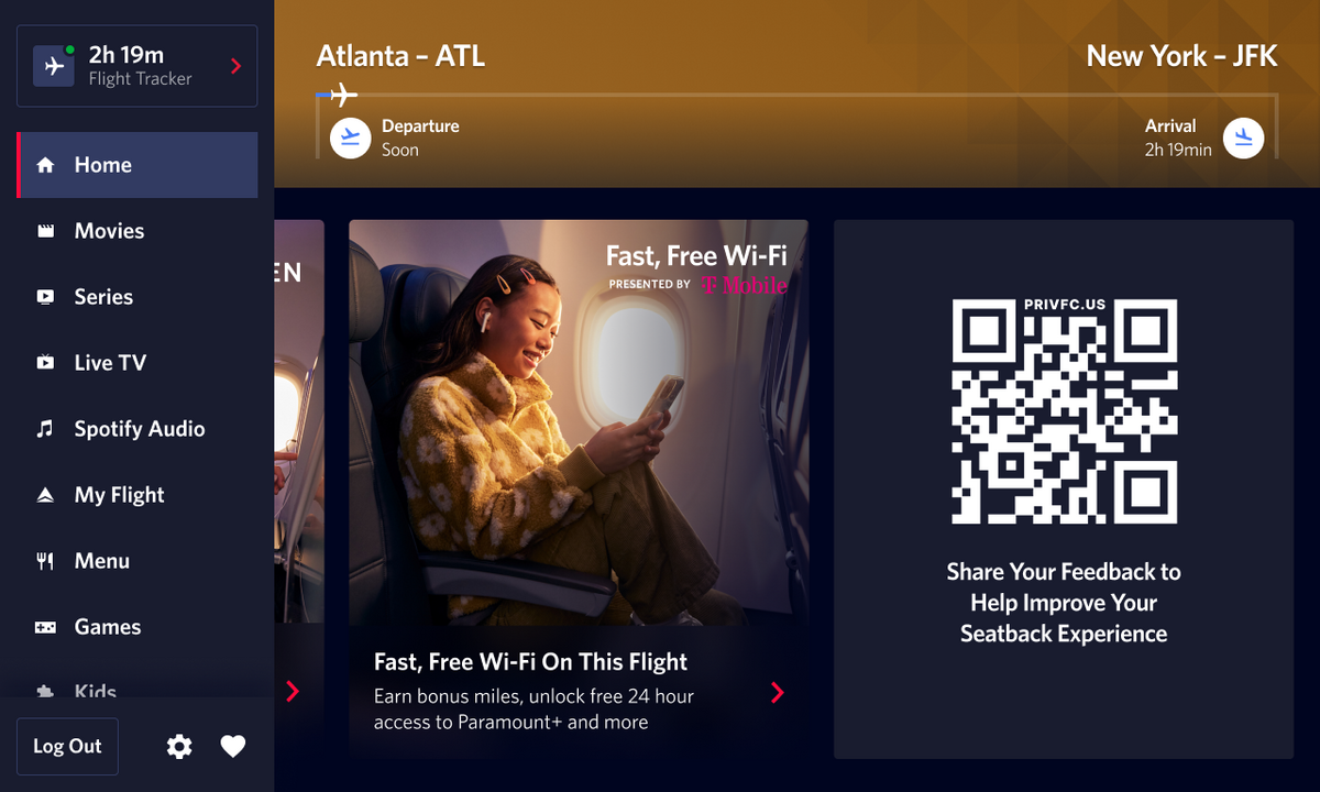 A seatback screen shows a QR code that gives customers the ability to give in-flight customer feedback.