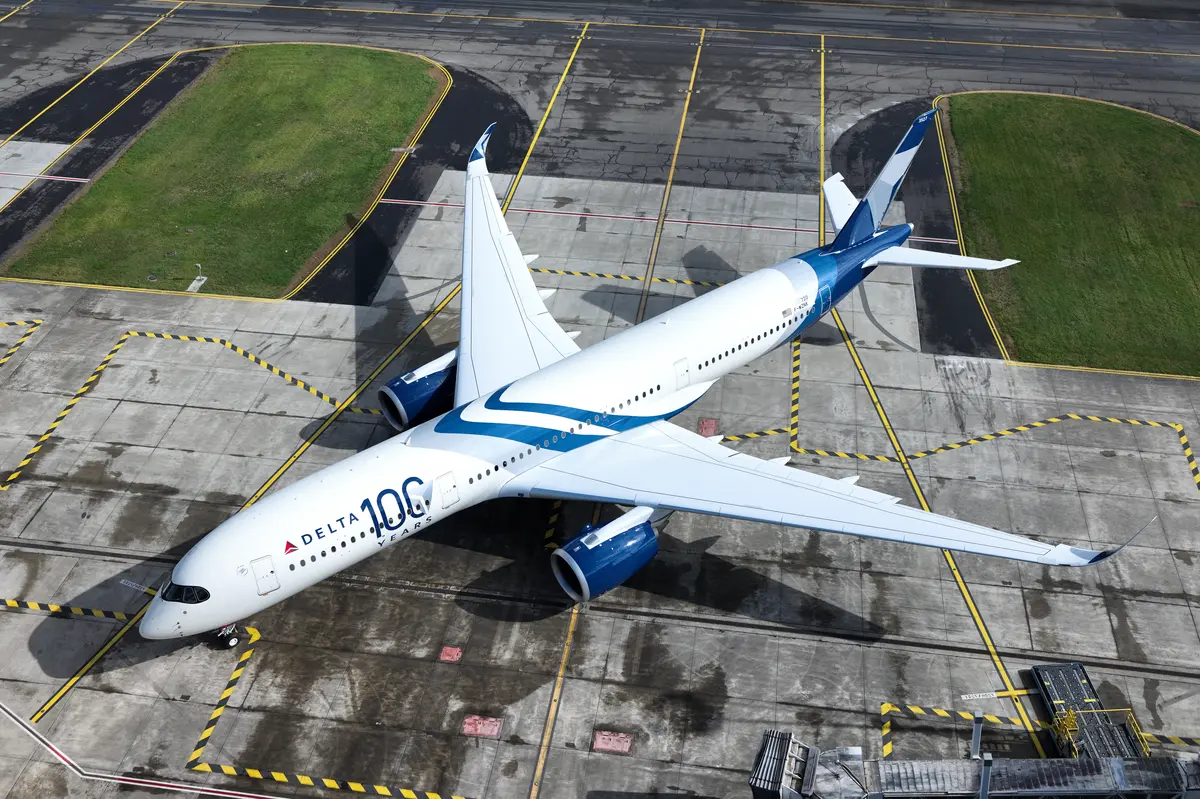 A drone view of Delta's Centennial livery, which features swooping designs and a bold 100 emblem.
