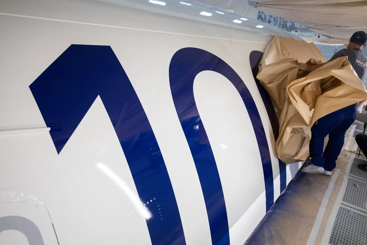A bold 100 emblem is unmasked for Delta's Centennial livery.