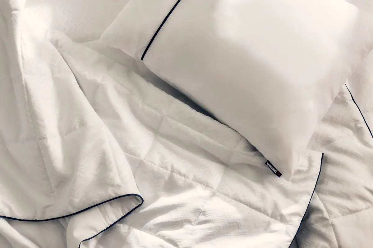 The new Delta One bedding set will include the Missoni duvet and white sleeping pillow, which feature a subtle and elegant Missoni zigzag design and navy accents. 