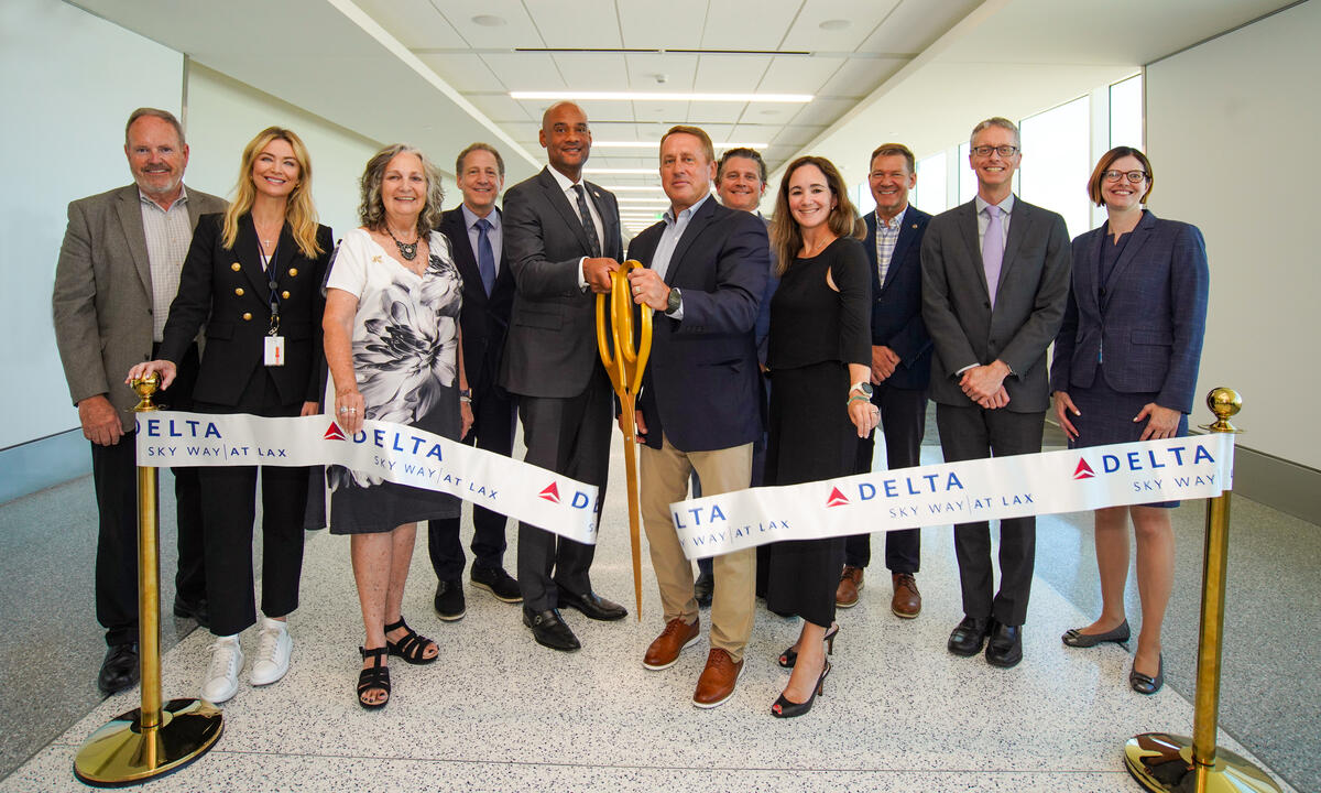 The ribbon cutting for the unveiling of Delta and Los Angeles World Airports' final major phase of the Delta Sky Way at LAX project.