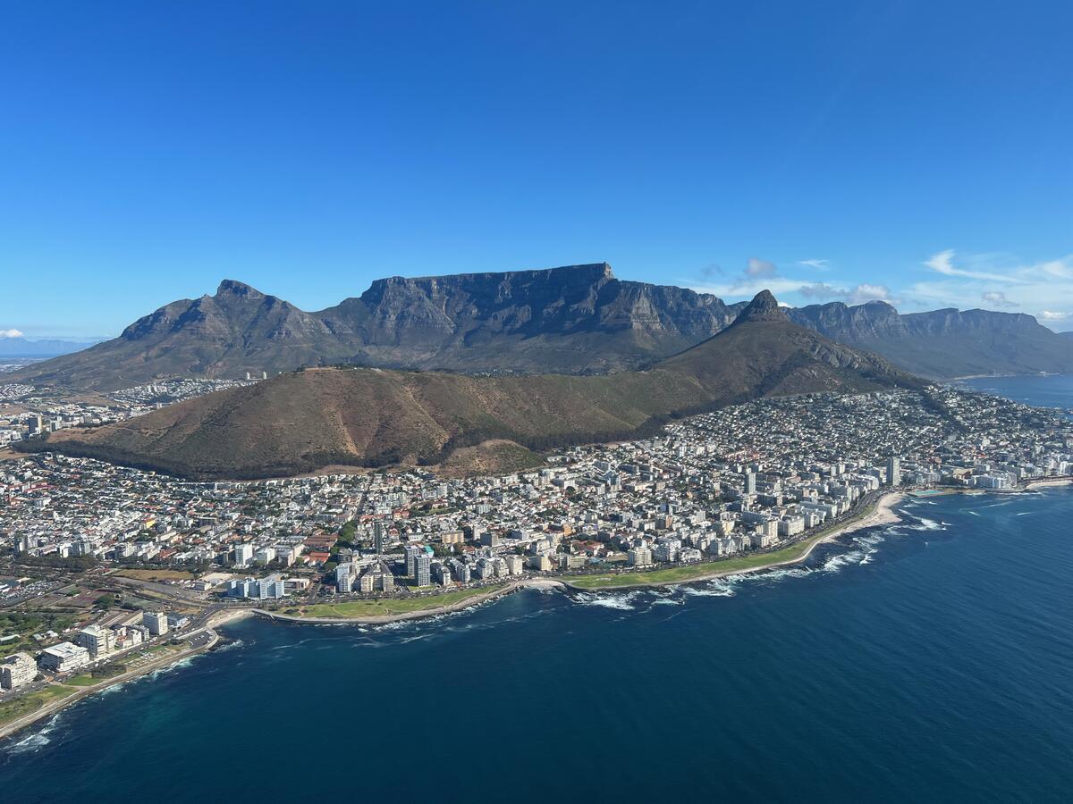 Cape Town, South Africa is located on the country’s southwest coast, bordering the sea beneath the dominant Table Mountain.