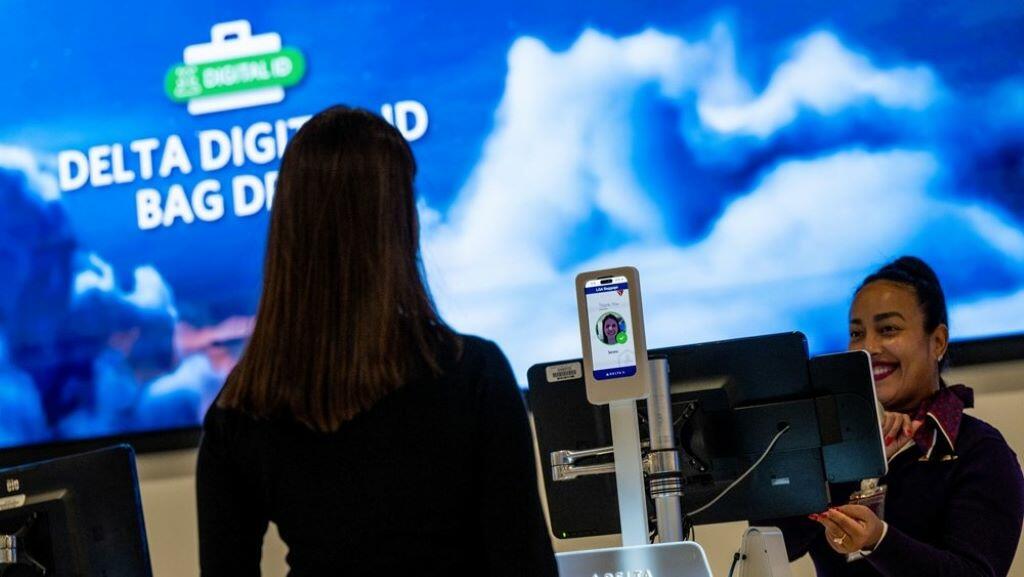 A customer uses Delta's Digital ID feature at the airport.