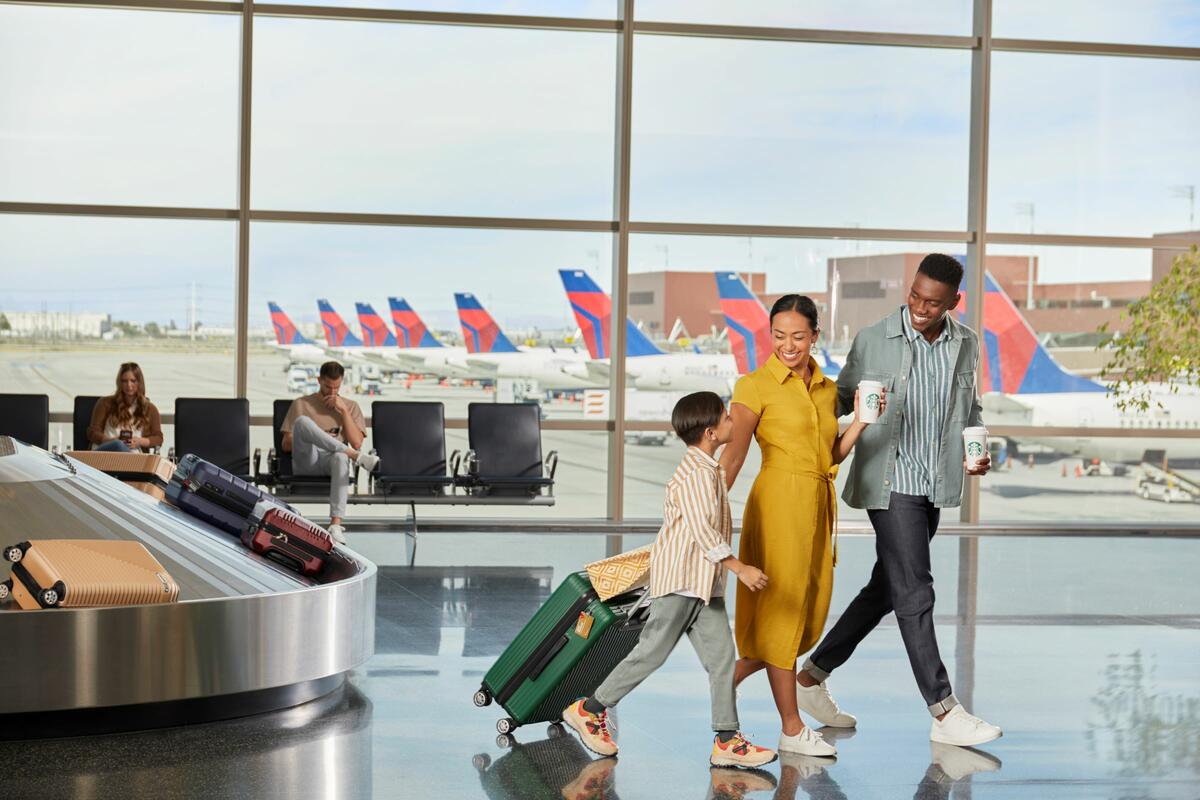 In this October 2022 stock photo, Delta customers enjoy Starbucks beverages.