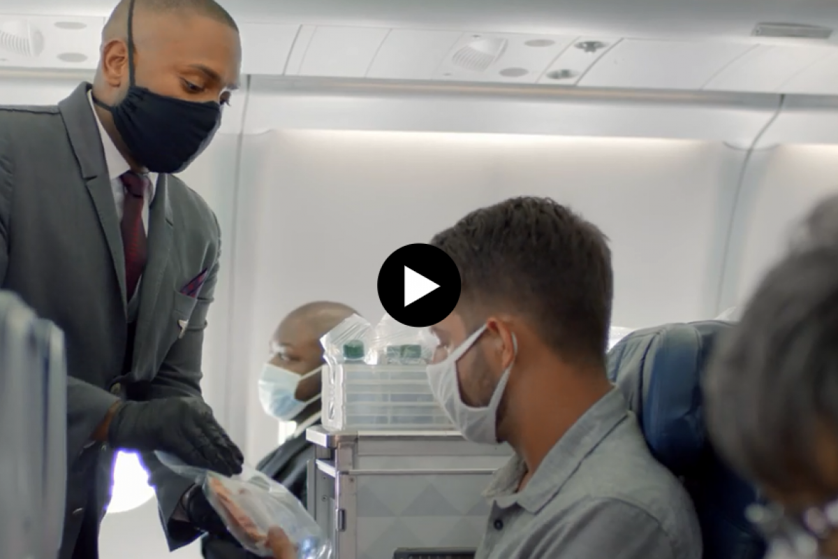 Delta CareStandard flight attendant with mask