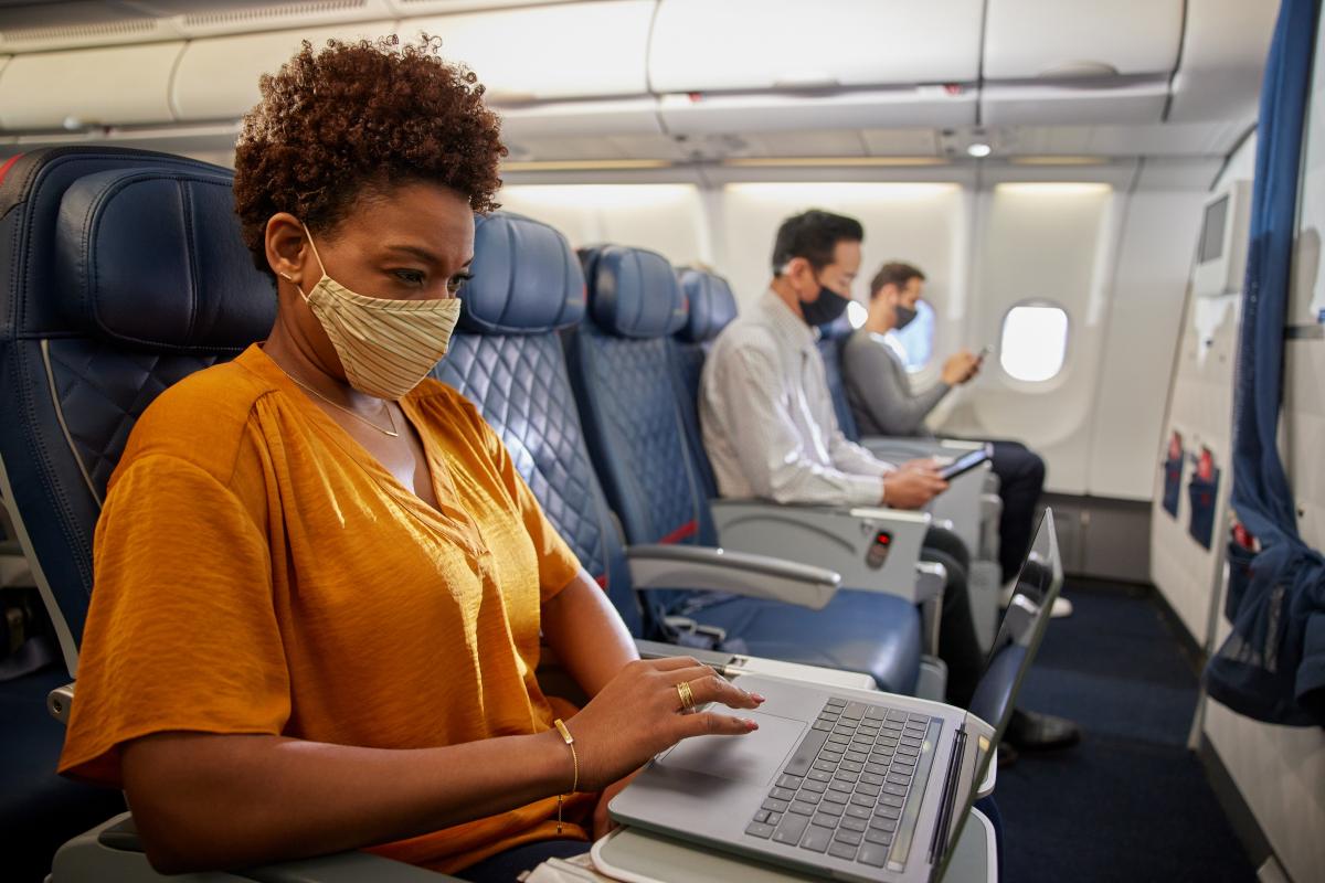 Customer on aircraft with mask