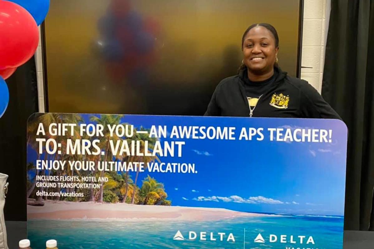 Melissa Vaillant was surprised Friday with the gift of a summer vacation from Delta Air Lines and Delta Vacations.