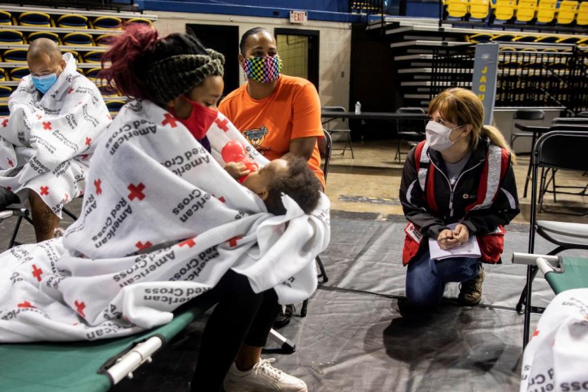 Families receive help at an American Red Cross shelter.