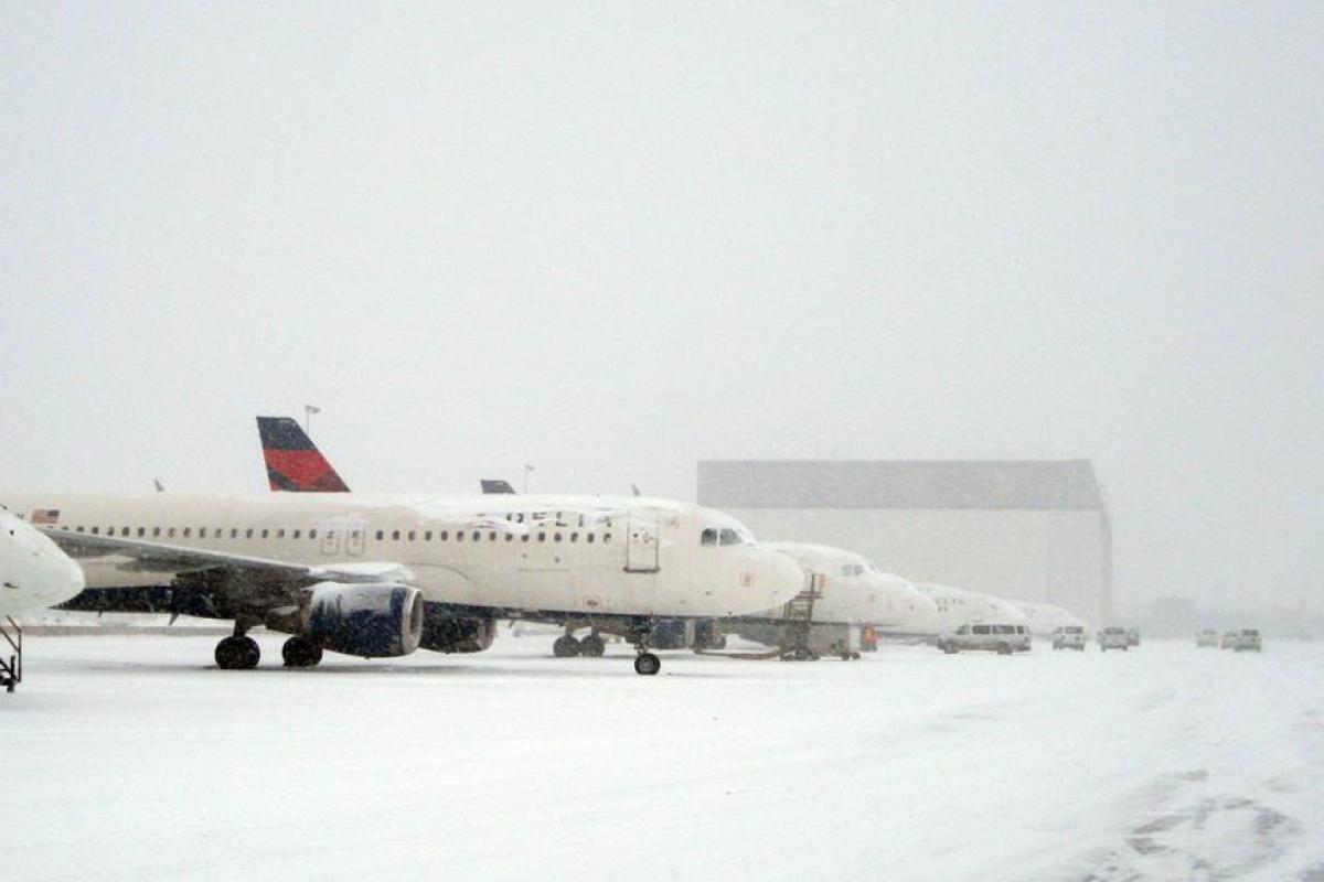 Parked Delta planes in the snow