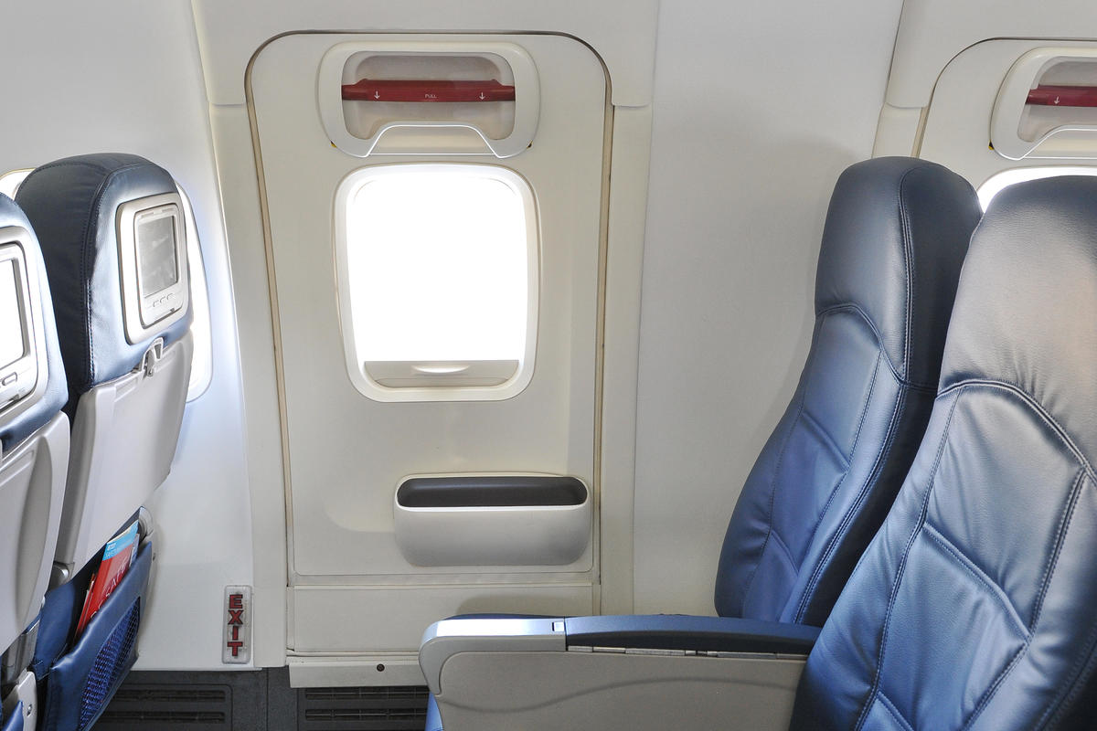 A 737-800 interior seating and emergency window view