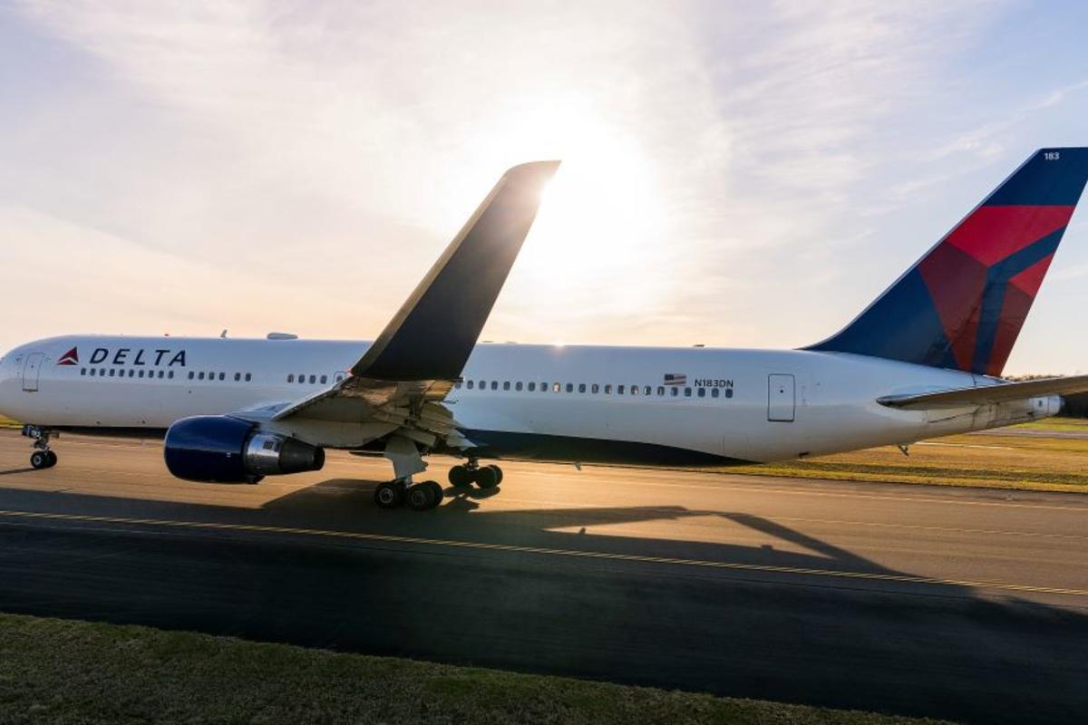 During the heat of the day, Delta's Boeing 767-300 gears for takeoff with a cruising speed of 517 mph.