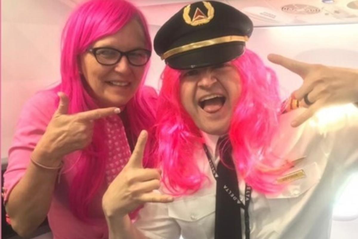 Flight attendant Robin Schmidt is pictured with one of her Delta colleagues.