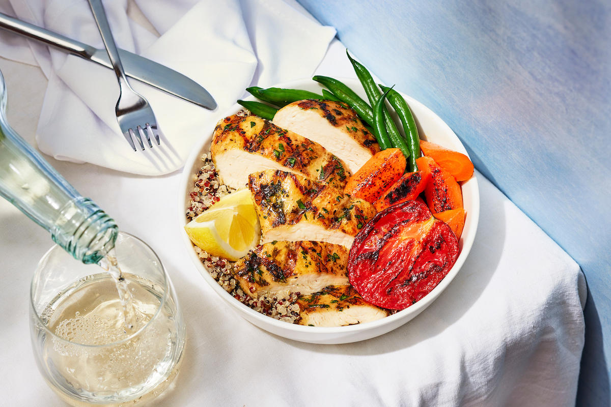 Hearty, simply prepared roasted chicken comes with quinoa, green beans, roasted carrots and Roma tomato.