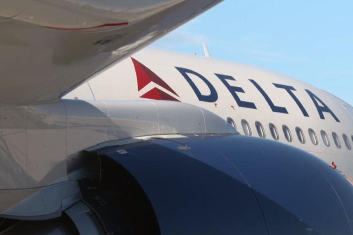 Side view of Delta A330-900 aircraft displaying Delta logo.